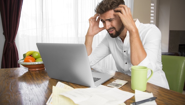 Stressed Out Entrepreneur Trying To Cope With End of Quarter Facebook Advertising Costs